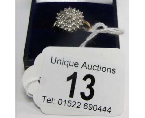 A 9ct gold diamond cluster ring, size R
