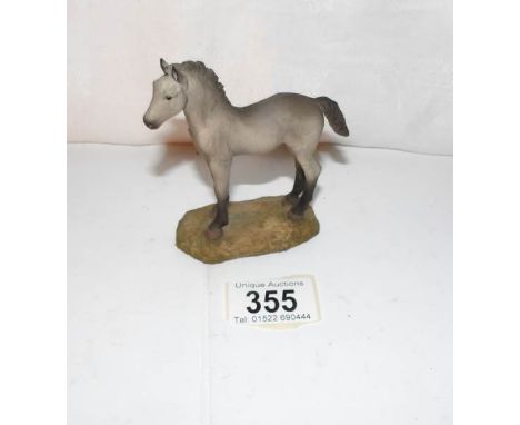 A small North Light sculpture of a horse
