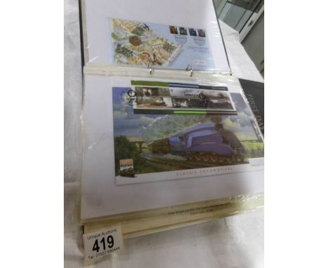 A folder of GB coin first day covers including silver coins and a folder of world first day covers
 
There are 10 coin covers