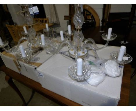 A pair of 5 light glass chandeliers