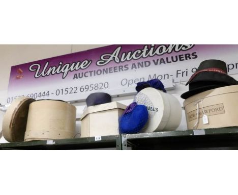 A quantity of vintage hats and hat boxes