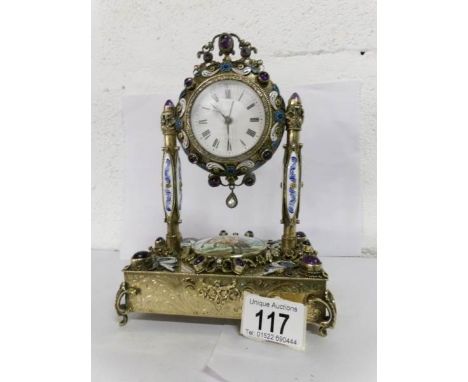 A 1920's silver gilt and enamel clock