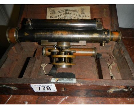 A small dumpy style surveyor's level by T B Winter of Newcastle, complete with additional telescope tube and staff head mount