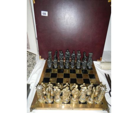 A brass and bronze chess set