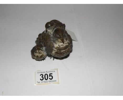 A Geschutz signed bronze bird with chicks inkwell