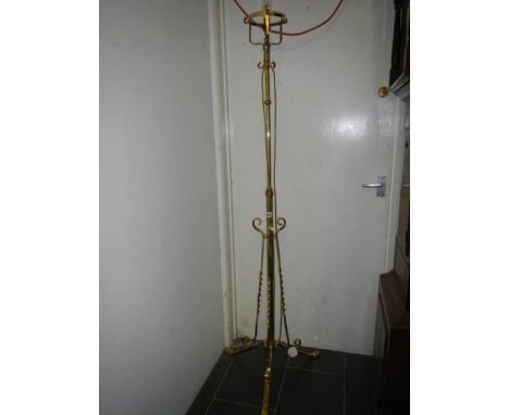 A Victorian brass standard lamp