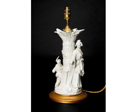 GERMAN WHITE PORCELAIN 'CHINOISERIE' TABLE LAMP, modelled with two figures around a tree, unmarked, 30cm hComments: all hands