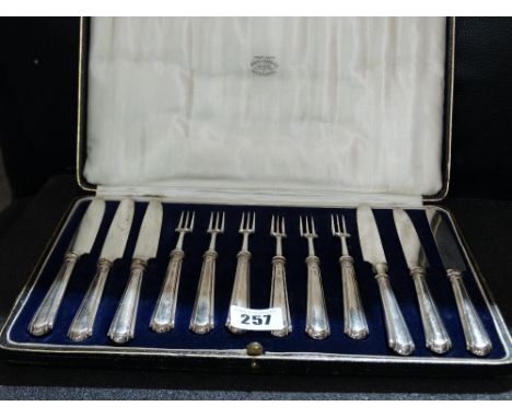 A Twelve Piece Silver Handled Fruit Knife And Fork Set