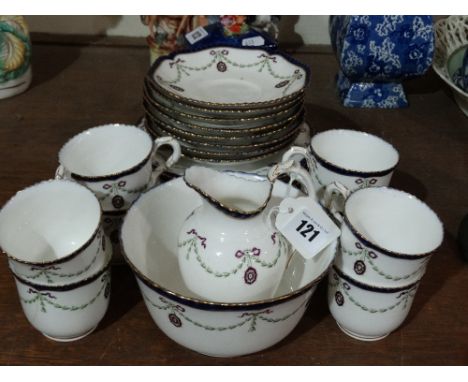 A Royal Worcester Blue And Gilt Garland Decorated Part Tea Set