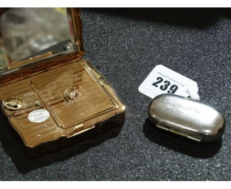 A White Metal Sovereign And Half Sovereign Case Together With An Enamel Decorated Compact