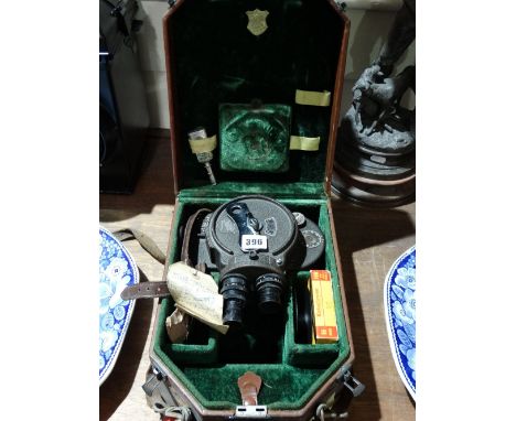 A Boxed Bell & Howell Company Cine Camera Model 70da In Original Box And Some Accessories
