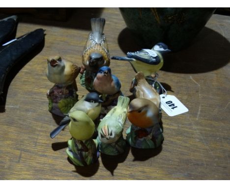 A Group Of Nine Royal Worcester Model Birds