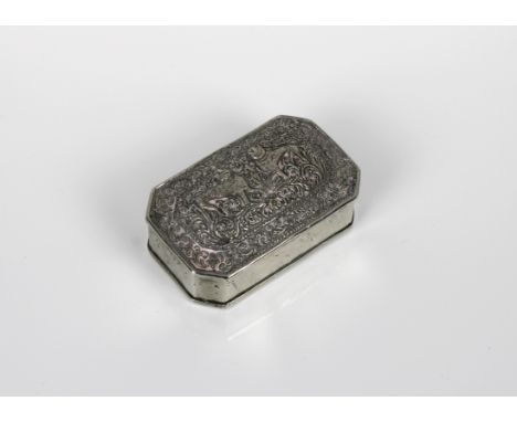 An Indian white metal trinket box of elongated octagonal form, the hinged domed cover embossed with a pair of cats, 3¼in. (8.
