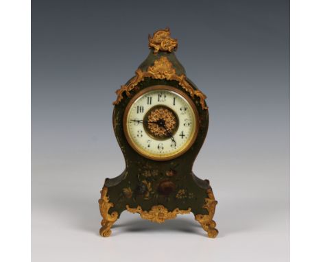A painted wood and gilt metal French mantel clock 10¾in. (27.4cm.) high.