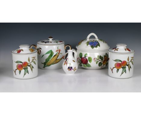 A collection of Royal Worcester Evesham pattern dinner ware to include a pair of biscuit barrels with covers, 7¾in. (19.7cm.)