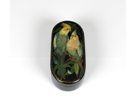 A mid to late 20th century Russian lacquer box of elongated oval form, the hinged cover depicting a pair of Cockatoo, signed 