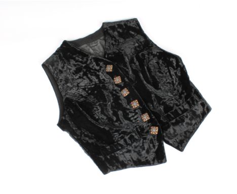 A vintage Dolce &amp; Gabbana black velvet button down cropped vest waistcoat size 44, having six floral &amp; foliate pierce