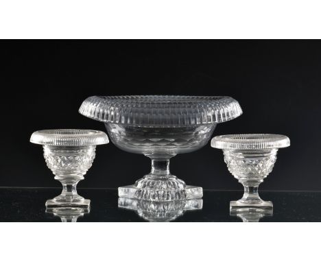 A small 18th century Irish cut glass turnover bowl of oval pedestal form, square lemon squeezer base, 8in. (20.3cm.) long, 5i