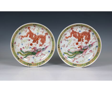 A pair of Chinese famille rose dragon and phoenix dishes / bowls dragon chasing flaming pearl and phoenix decoration, key pat