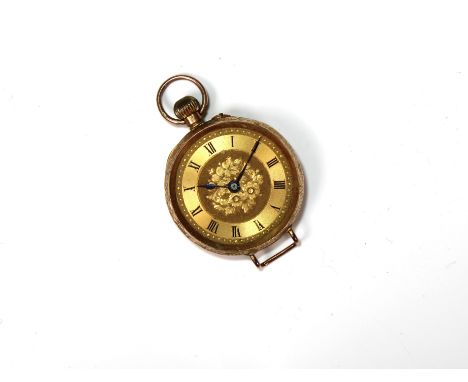 A Ladies 9ct. gold open faced pocket watch foliate engraving to face and back, the back with central shield cartouche engrave