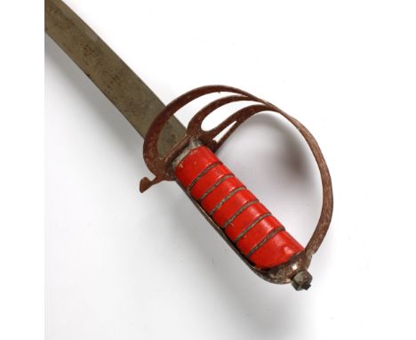 A 20th Century cavalry sword stamped 'made in India', with red leather scabbard, blade measures 29½ inches (75cm)