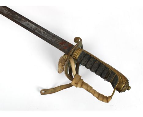 A Victorian 1882 Pattern Infantry Officers Sword 83.2cm. single fuller, etched tapering blade, proof marked, brass hilt with 