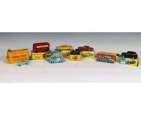 A collection of playworn boxed die-cast cars comprising a Corgi - 303 Mercedes-Benz 300L (broken glass), 418 Austin Taxi, 221