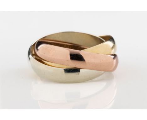 A 9ct gold Russian wedding ring The trinity wedding ring with three bands in 9ct yellow, white and rose gold, ring size K.