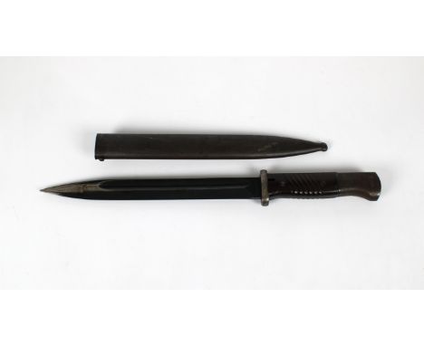 A WWII German Army K98 bayonet the 25cm. single edge fullered blued steel blade stamped Coppel G.m.b.H., 3892k, guard stamped