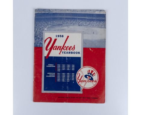 The official Yankees yearbook showcases the full roster of players, highlighting their talents and achievements. It features 