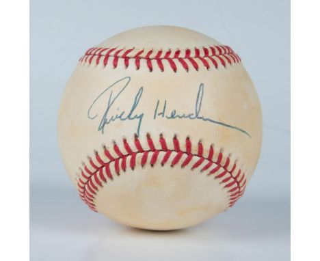This is an official American League baseball signed in blue ink by Hall of Famer Rickey Henderson. Certificate of Authenticit