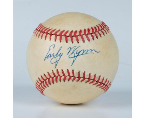 This is an official American League baseball signed in blue ink by Hall of Famer Early Wynn. Certificate of Authenticity from