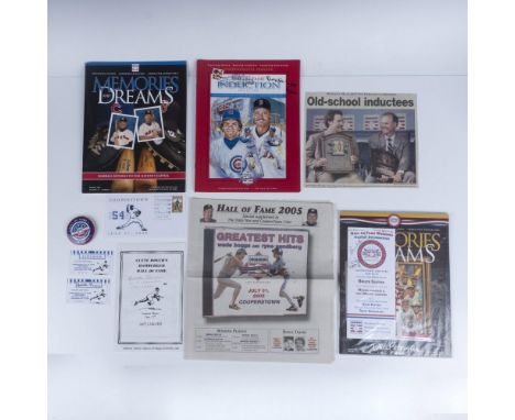 This collection features a unique mix of memorabilia, including a Clete Boyer's Hamburger Hall of Fame Restaurant menu signed