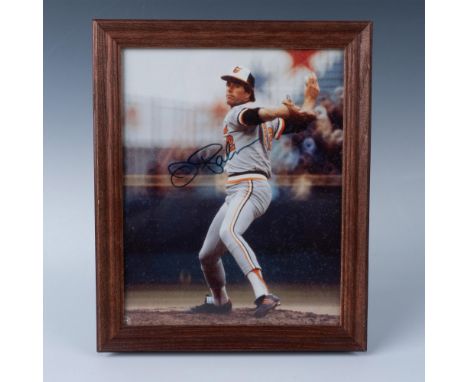 This is a color photograph of legendary Orioles Pitcher, Jim Palmer also signed in blue ink by Palmer. This item is in a fram