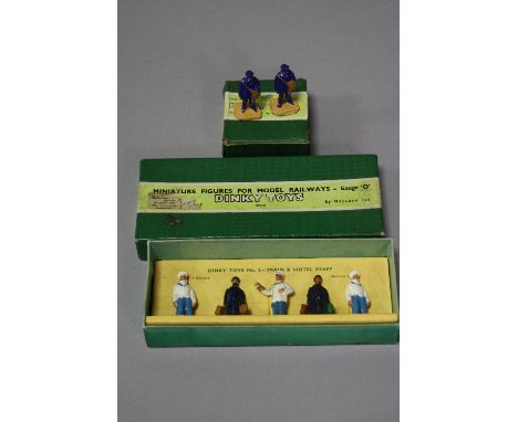 A BOXED DINKY TOYS TRAIN AND HOTEL STAFF SET NO.5, set of five original figures complete and in fairly good condition, minor 