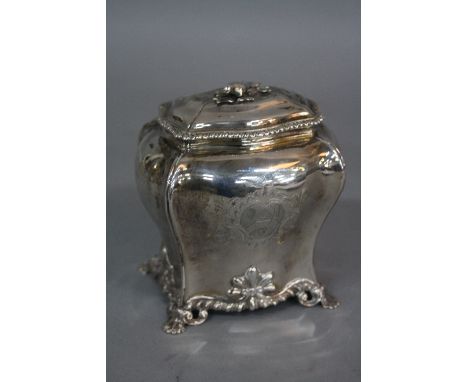 A GEORGE II SILVER TEA CADDY, of bombe outline, the pull off cover with bird finial and gadrooned rim, the caddy engraved wit