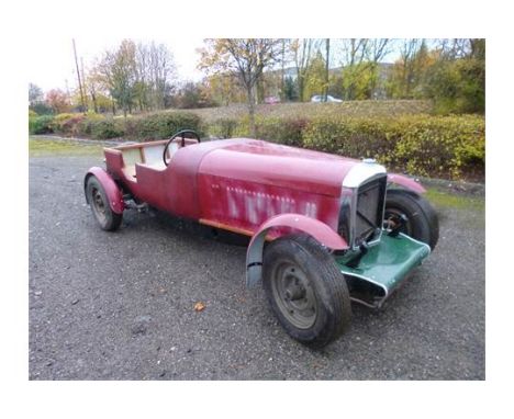 A RED BENTLEY 4 1/4 LITRE SALOON CAR, an MK6 model converted to a sports four seater, the Bentley Saloon body taken off and a