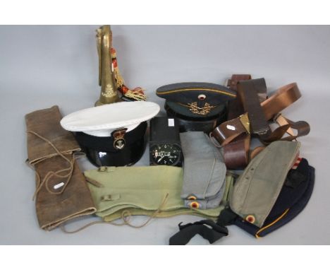 A BOX CONTAINING VARIOUS ITEMS OF MILITARIA, to include a Naval and a German Army Cap (2), a selection of five military Beret