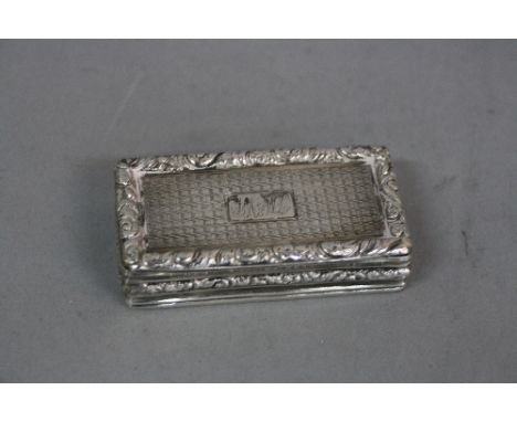 A GEORGE III SILVER RECTANGULAR SNUFF BOX, engine turned decoration with cast foliate scroll rims, engraved initials to lid, 