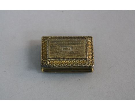 A GEORGE IV SILVER GILT RECTANGULAR VINAIGRETTE, engine turned and cast rims, foliate pierced grille, maker Thomas Sharp, Bir