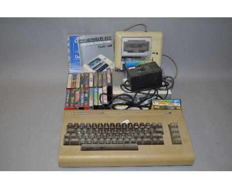 A COMMODORE 64 VINTAGE GAMING CONSOLE, with it's original power supply and manual, a 1530 Datassette unit (boxed with manual)