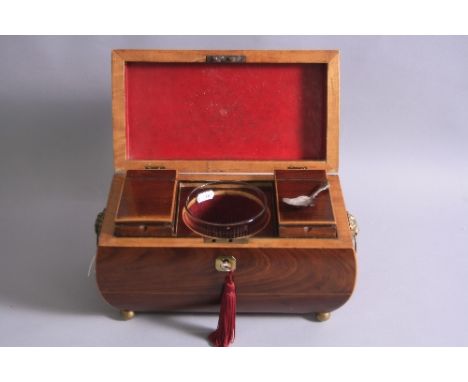 AN EARLY 19TH CENTURY WALNUT AND SATINWOOD BANDED SARCOPHAGUS SHAPED TEA CADDY, with brass Lion mask and ring handles, the in