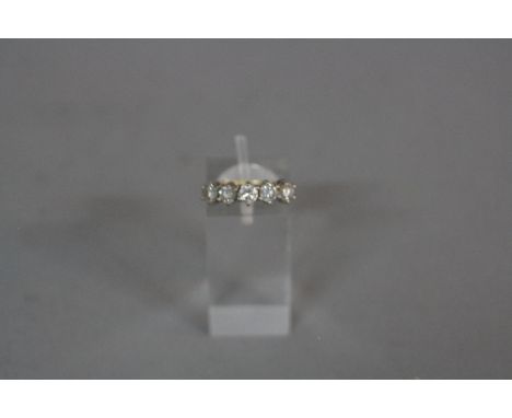 A MODERN FIVE STONE 18CT GOLD DIAMOND HALF HOOP RING, estimated total modern round brilliant cut weight 1.00ct, colour assess