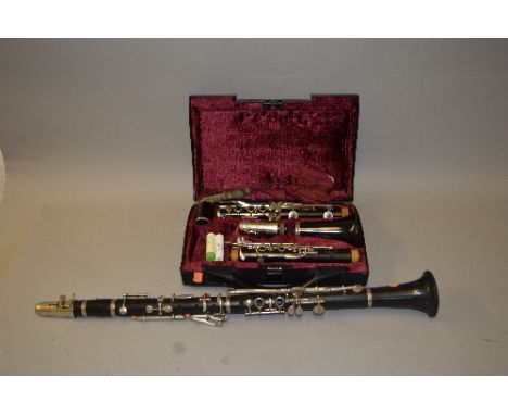A BOOSEY & HAWKES REGENT CLARINET, in it's case and another clarinet with no makers name