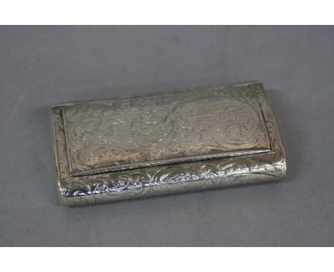 A MID 19TH CENTURY RUSSIAN SILVER RECTANGULAR SNUFF BOX, oval ends, hinged inset lid, foliate scroll engraved decoration, gil
