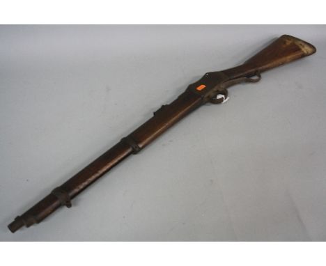 A .577'/.450'MARTINI-HENRY ARTILLERY CARBINE MK11, first approved for service on 16.6.1892, it is identified by its bayonet l