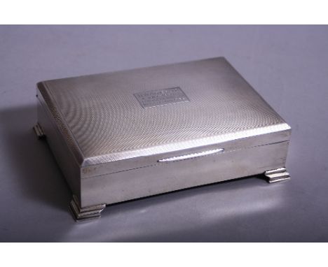 A GEORGE VI RECTANGULAR SILVER CIGARETTE CASE, engine turned cover with presentation inscription from 'The Birmingham Watch C