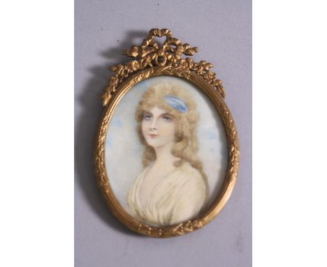 FOLLOWER OF ANDREW PLIMER, head and shoulders portrait miniature of a lady with powdered wig, blue ribbon in her hair, cream 