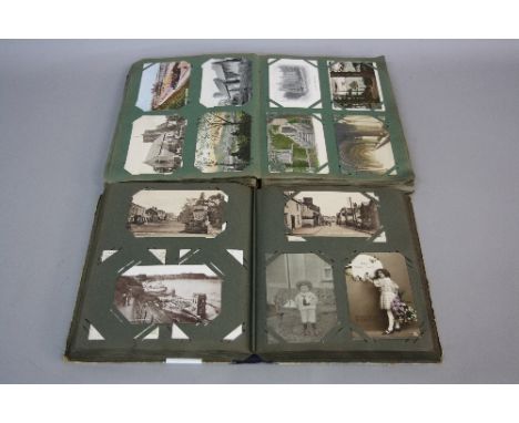 A VINTAGE POSTCARD ALBUM CONTAINING APPROXIMATELY THREE HUNDRED AND SEVENTY POSTCARDS, mostly early 20th Century, British top
