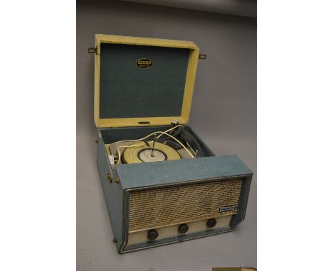 A DANSETTE CONQUEST AUTO RECORD PLAYER, with a Teal tolex finish, fitted with a Monarch turntable
